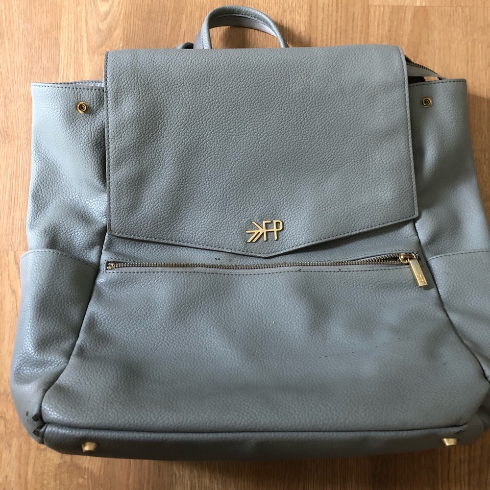 Freshly picked gray backpack ( used with some minor marks )